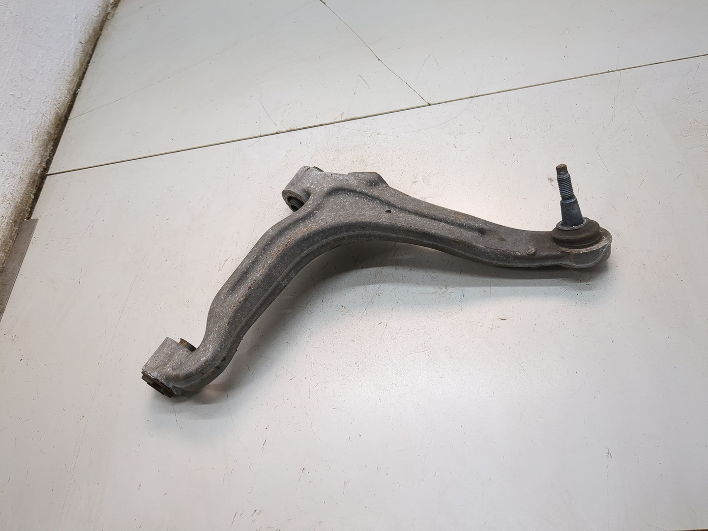 Рычаг задний левый