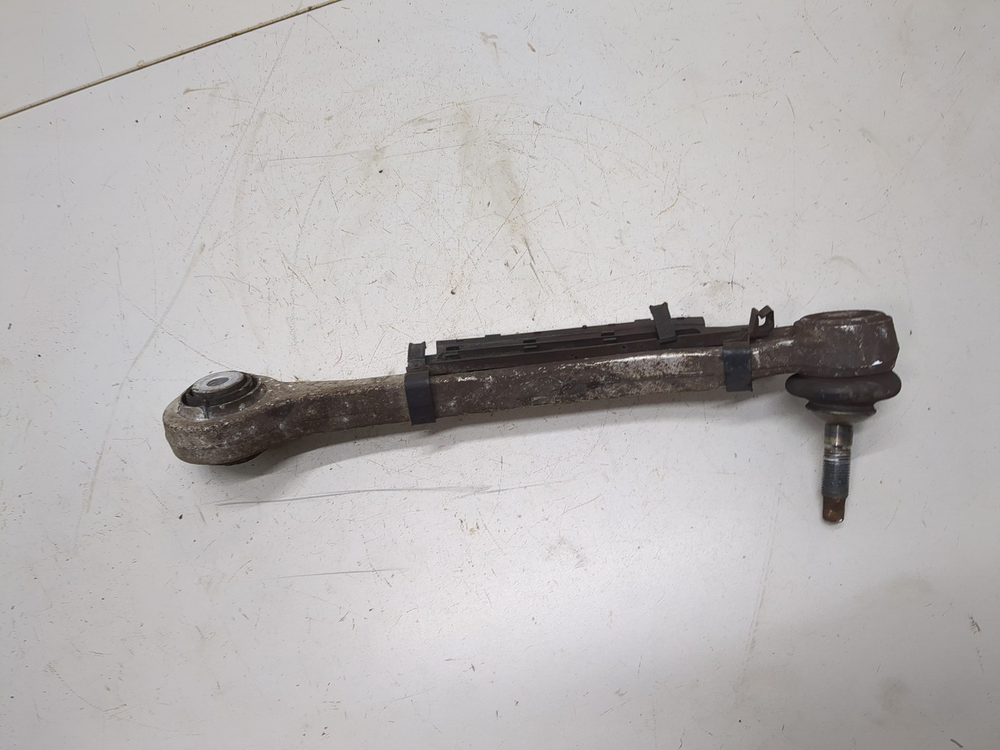 Рычаг задний левый