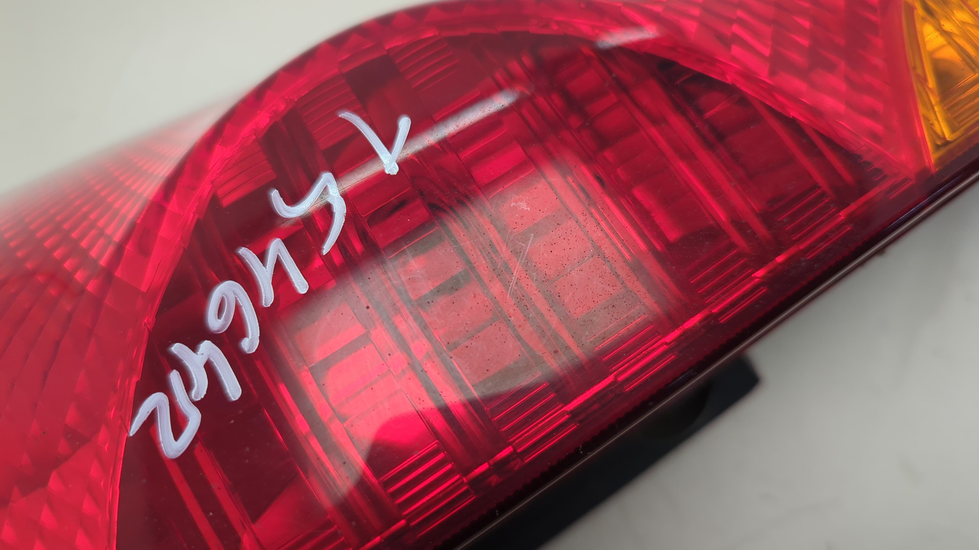 Фонарь задний левый