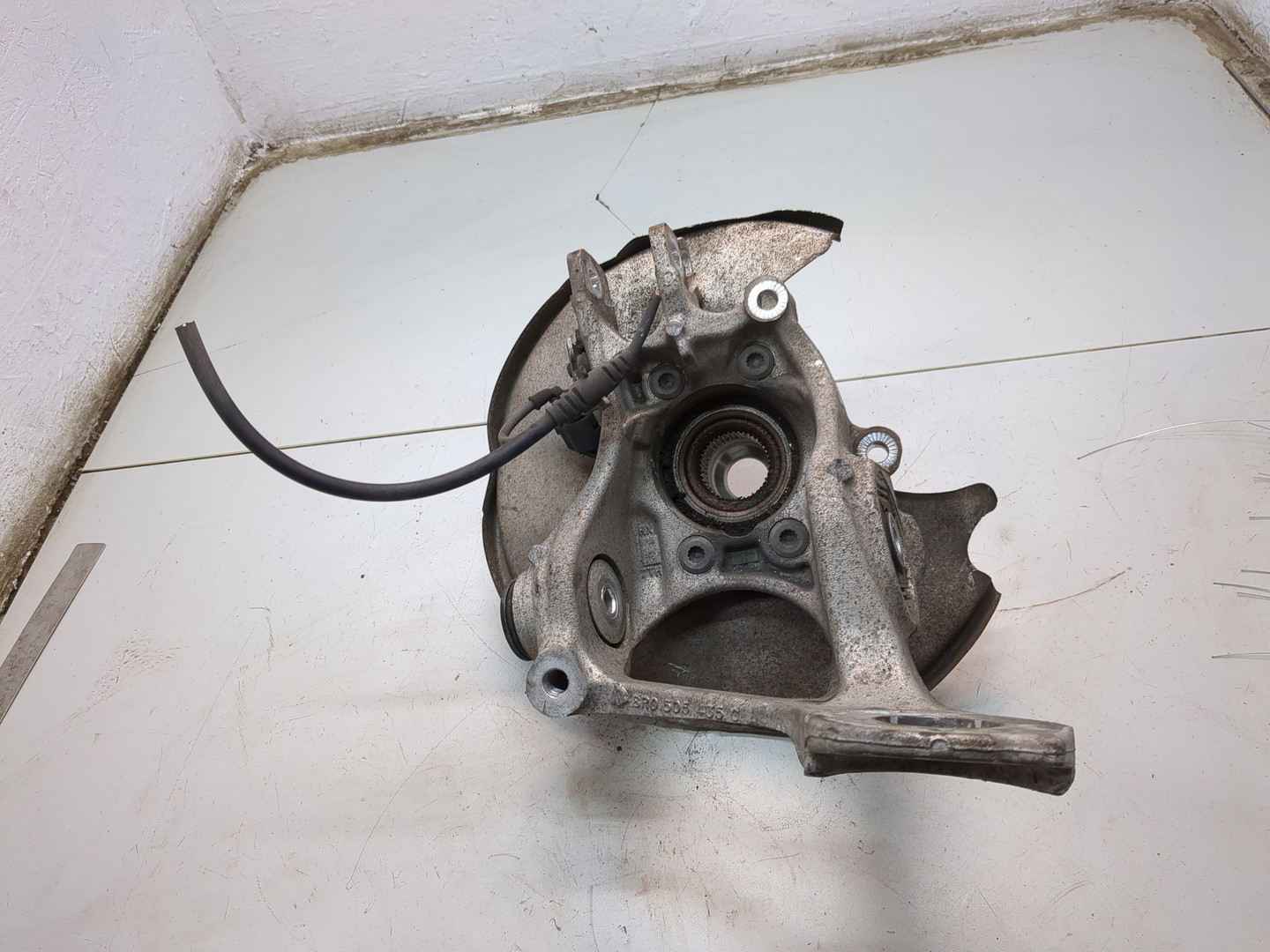 Кулак поворотный задний левый