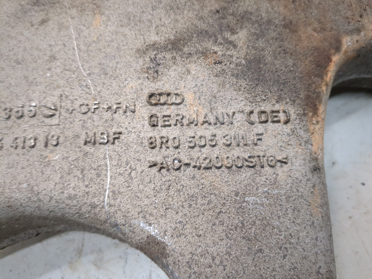 Рычаг задний левый