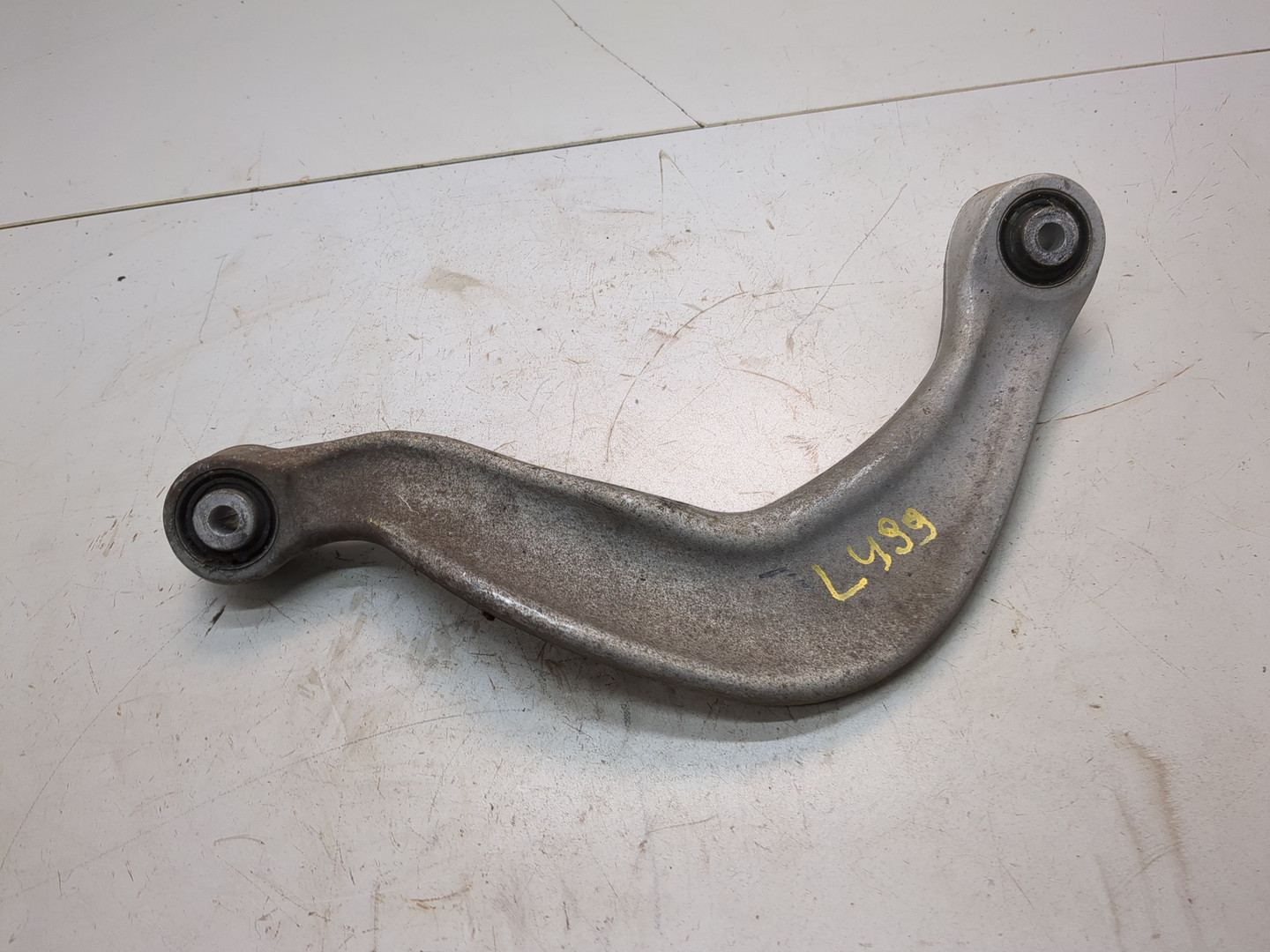 Рычаг задний левый