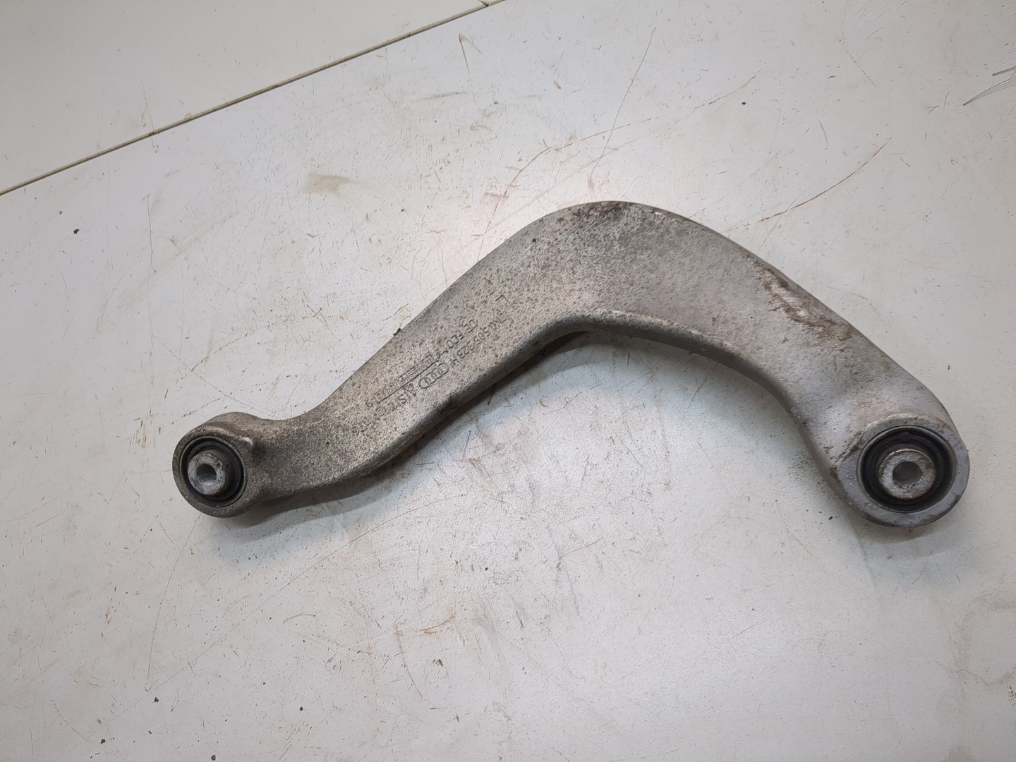 Рычаг задний левый