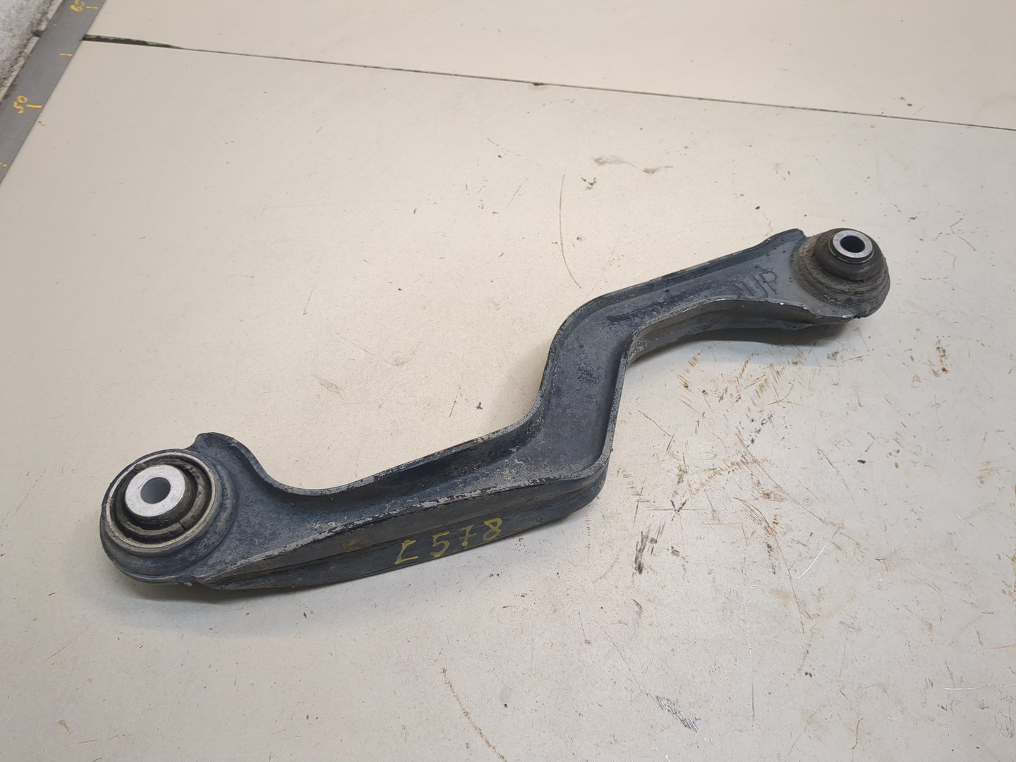 Рычаг задний левый