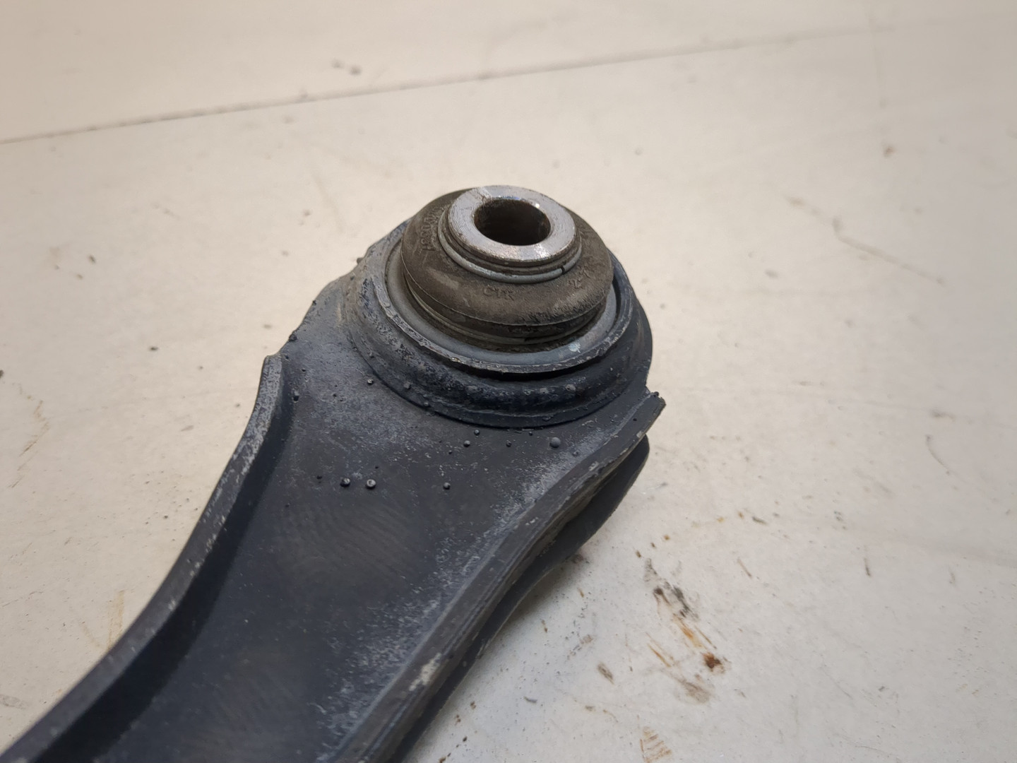 Рычаг задний левый