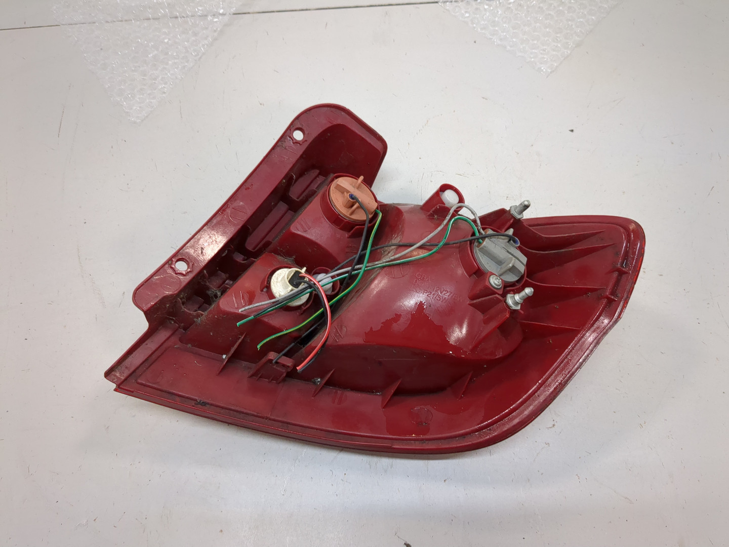 Фонарь задний левый