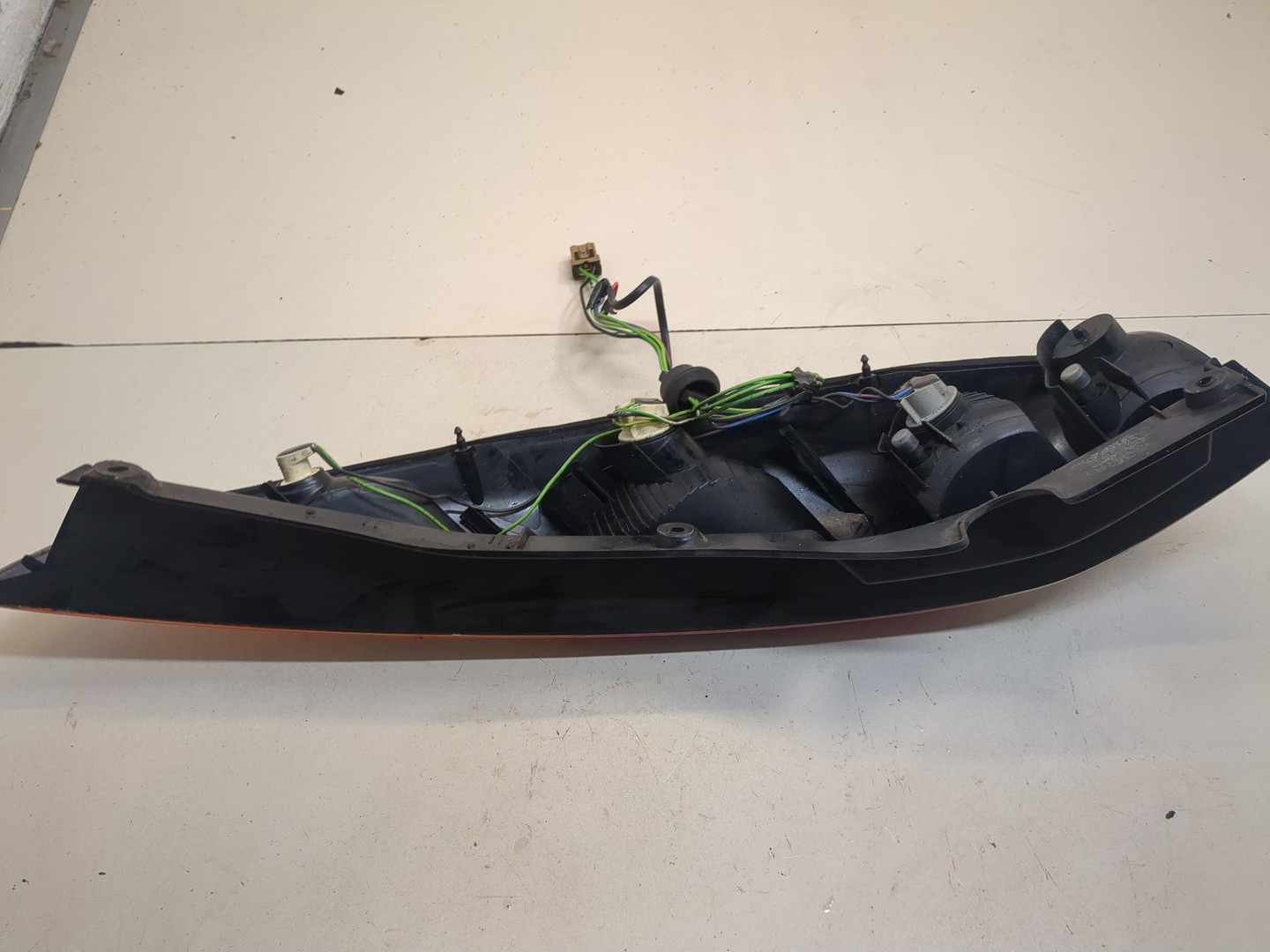 Фонарь задний левый