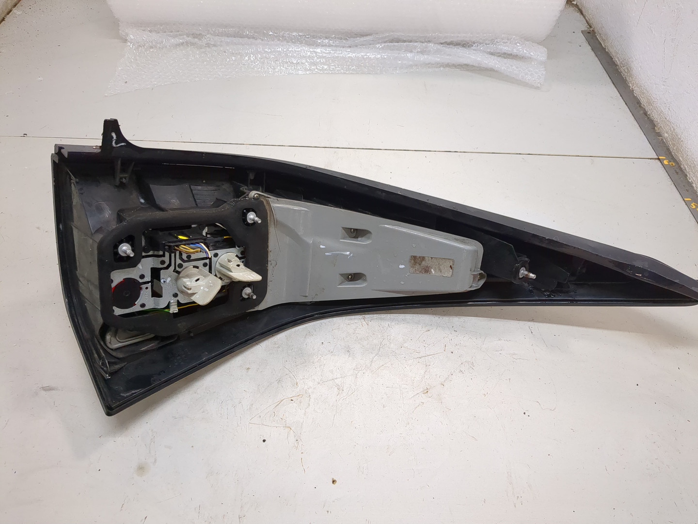 Фонарь задний левый