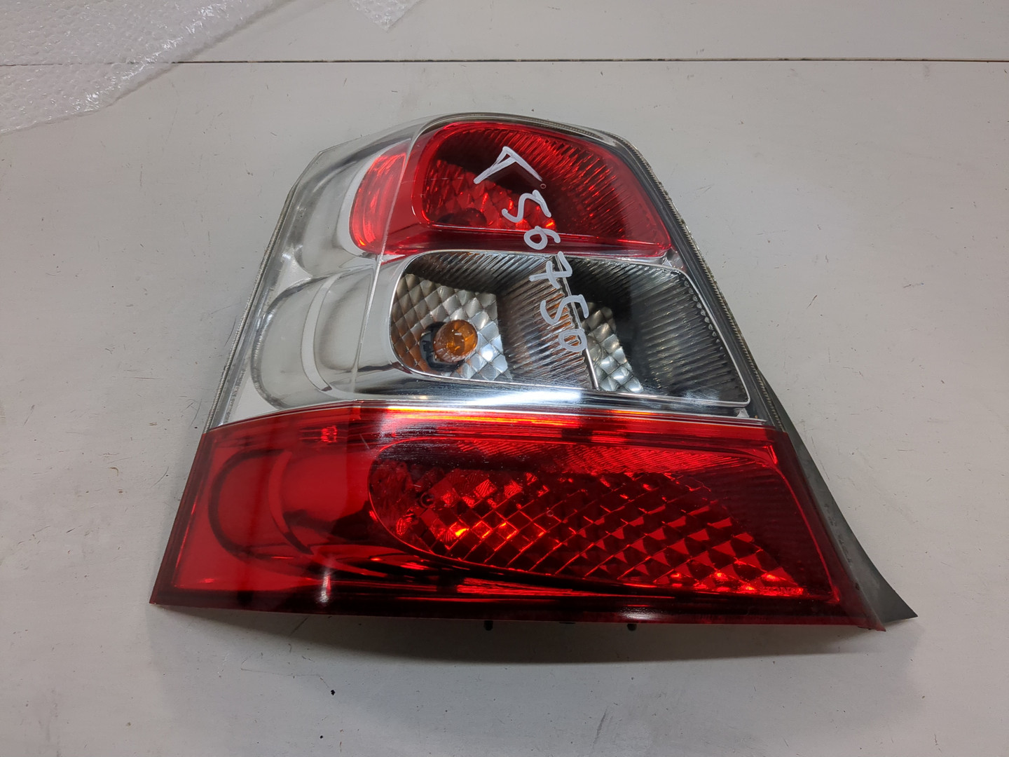 Фонарь задний левый