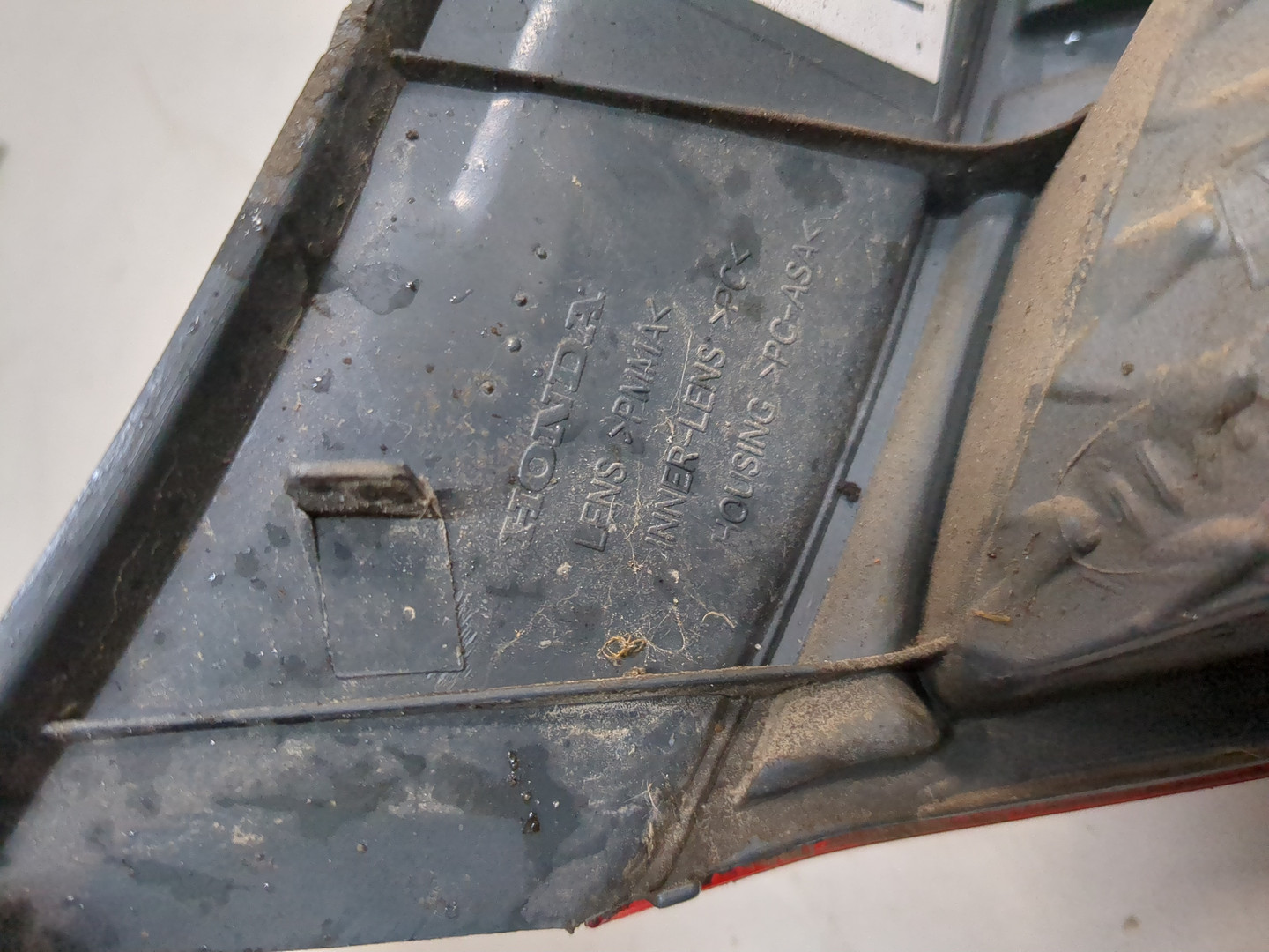 Фонарь задний левый