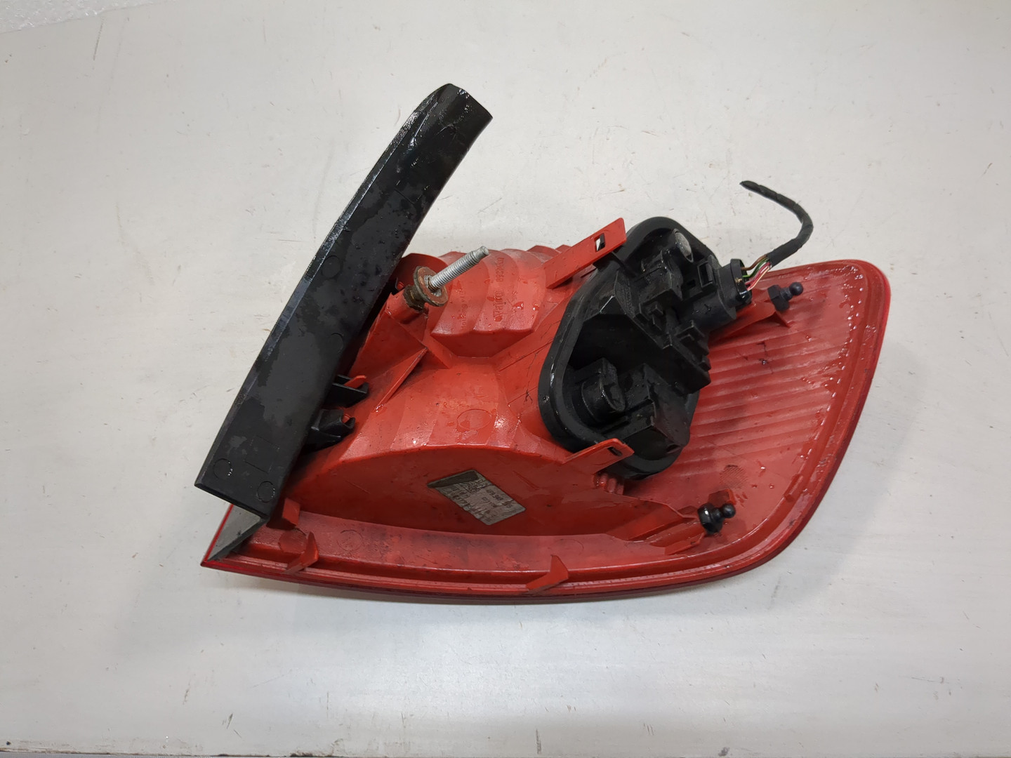 Фонарь задний левый