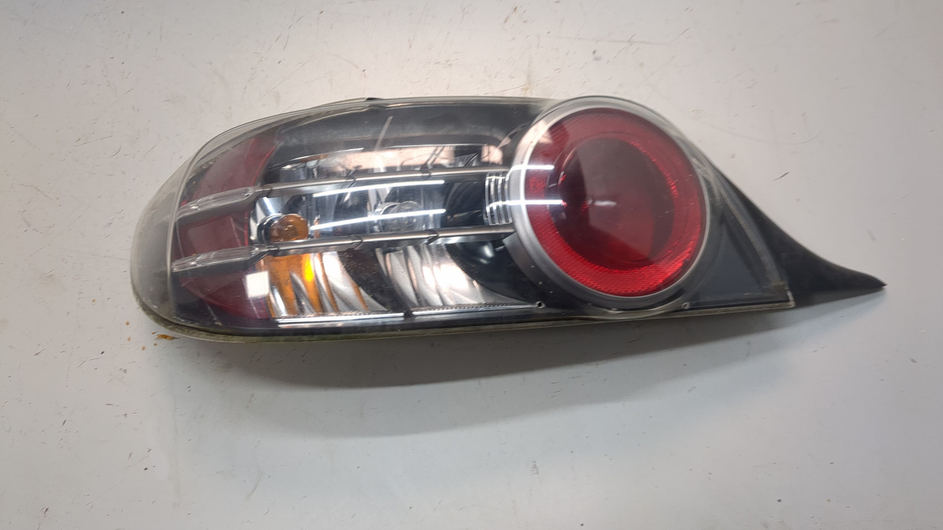 Фонарь задний левый