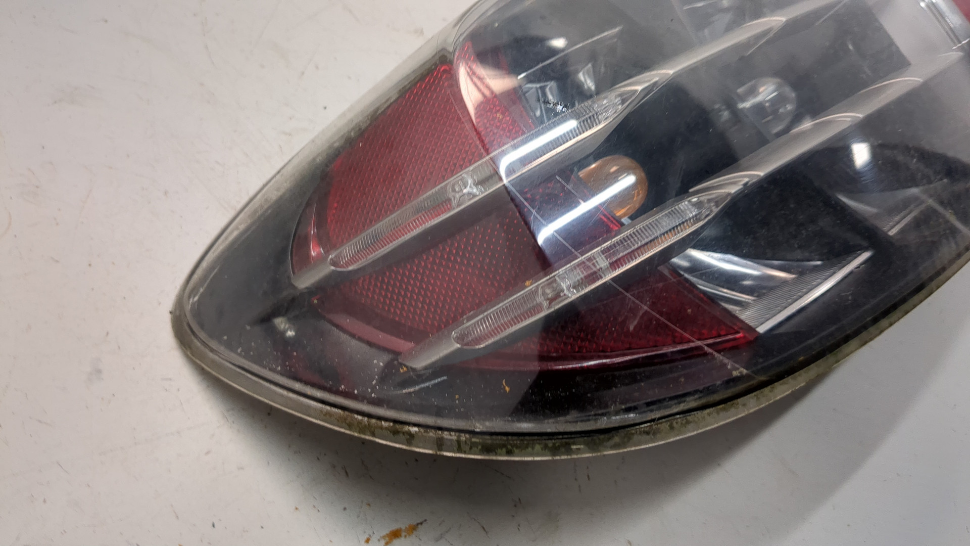 Фонарь задний левый