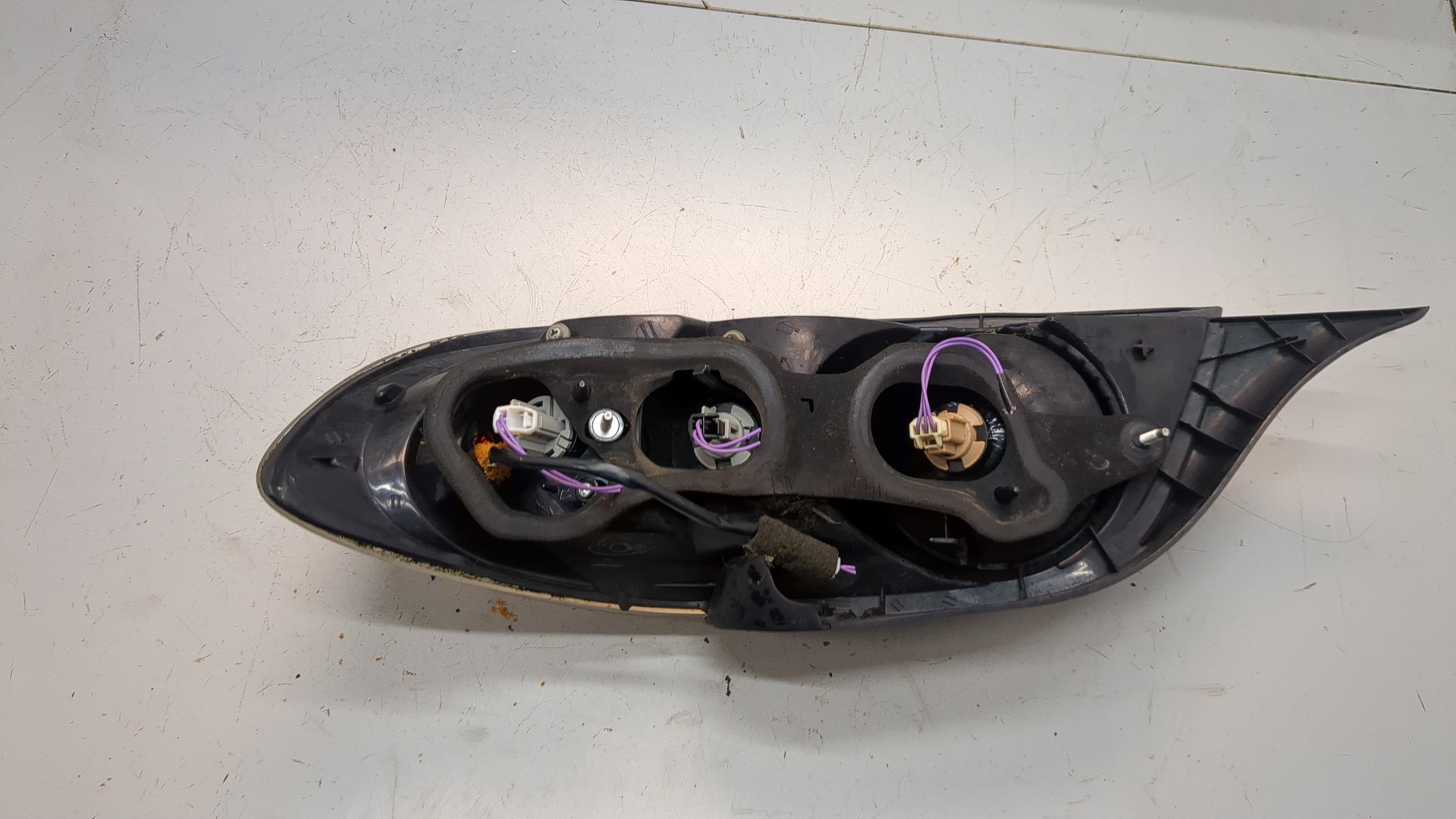 Фонарь задний левый