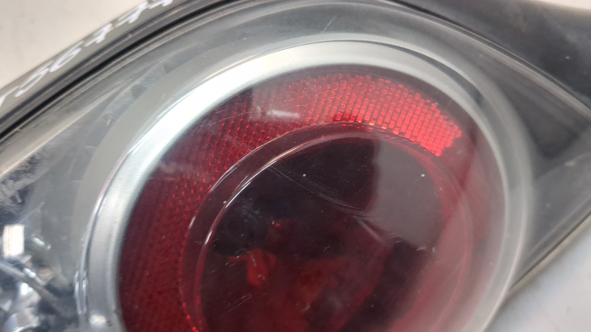 Фонарь задний левый