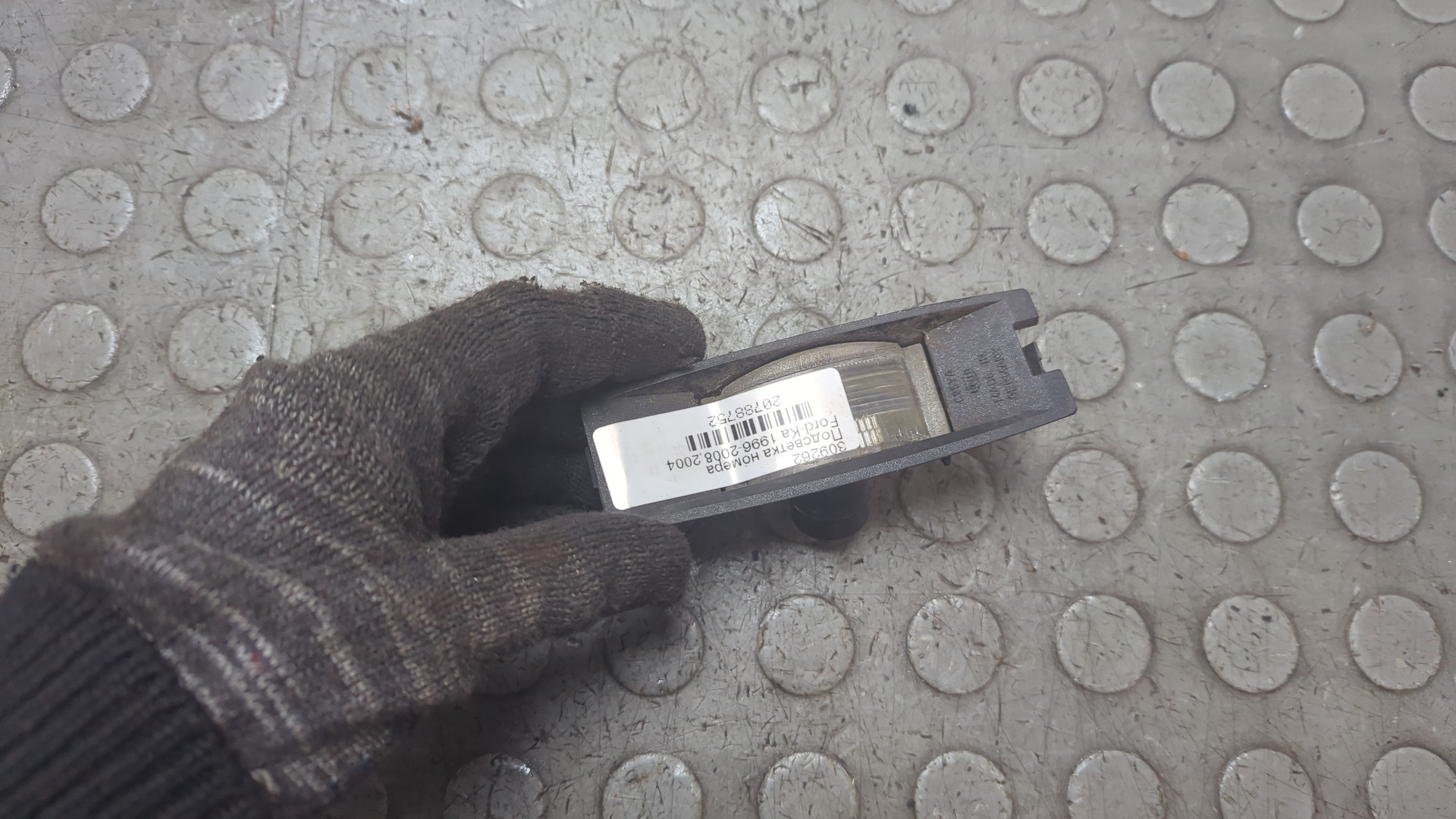 Фонарь подсветки номера