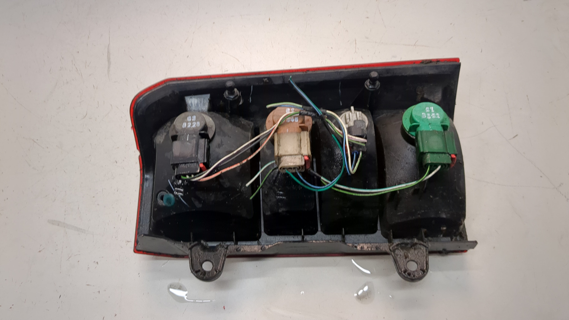 Фонарь задний левый