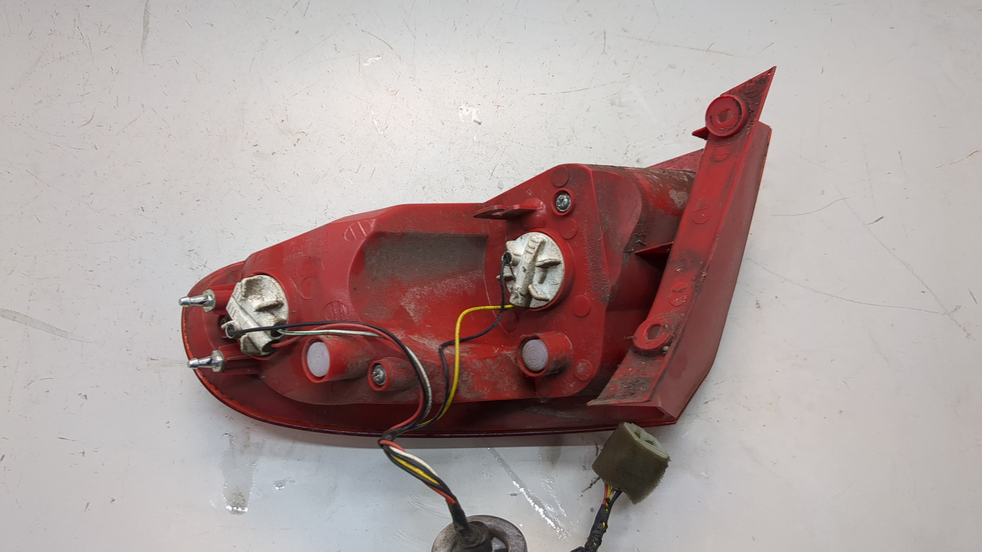 Фонарь задний левый