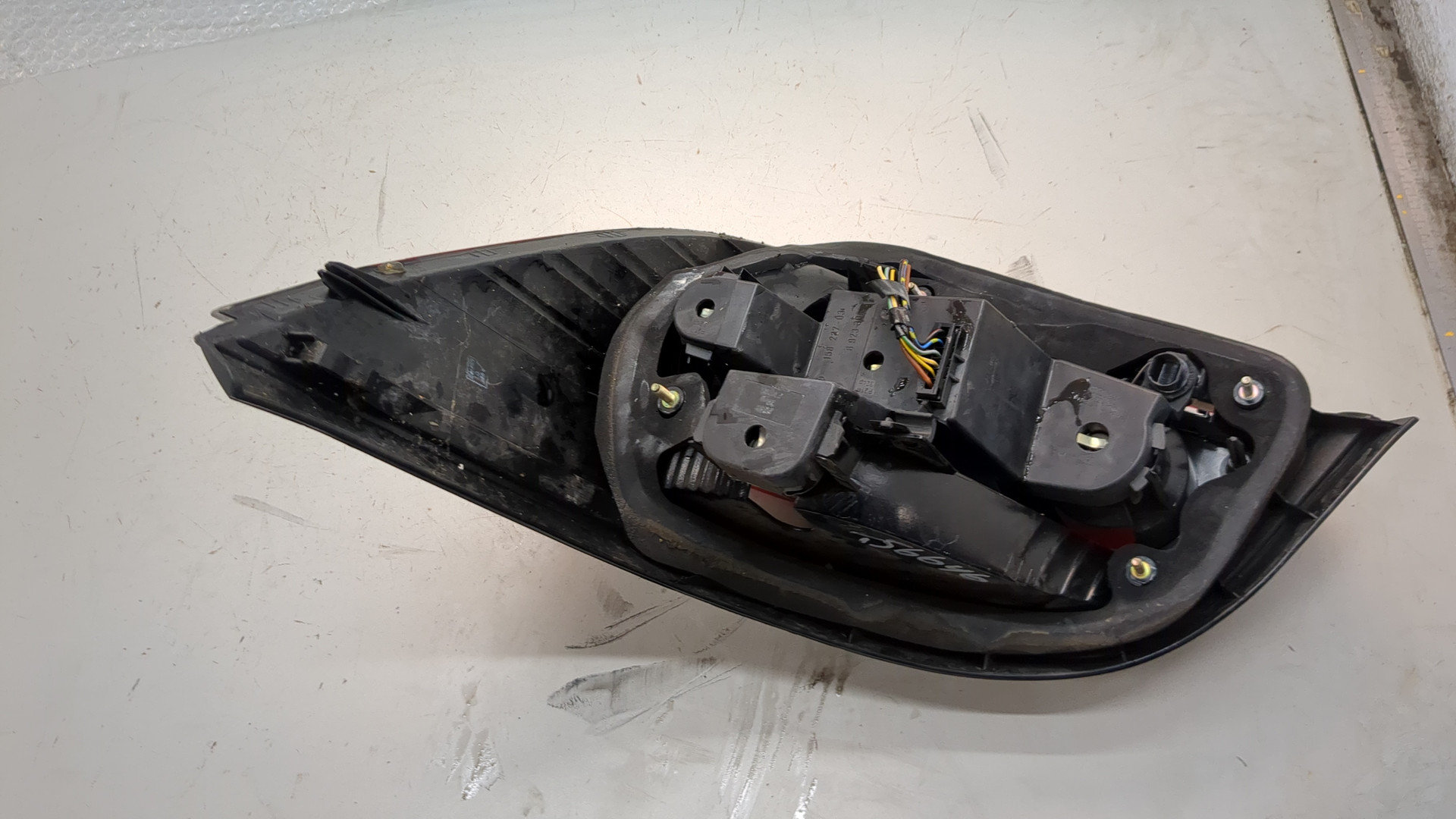 Фонарь задний левый