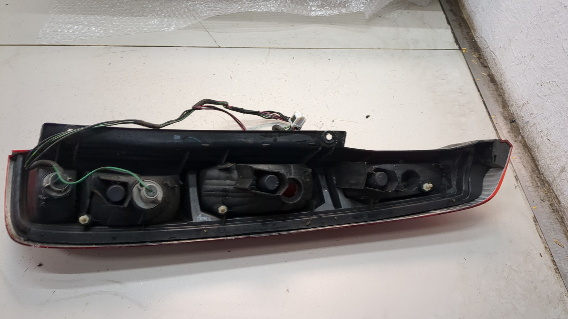 Фонарь задний левый