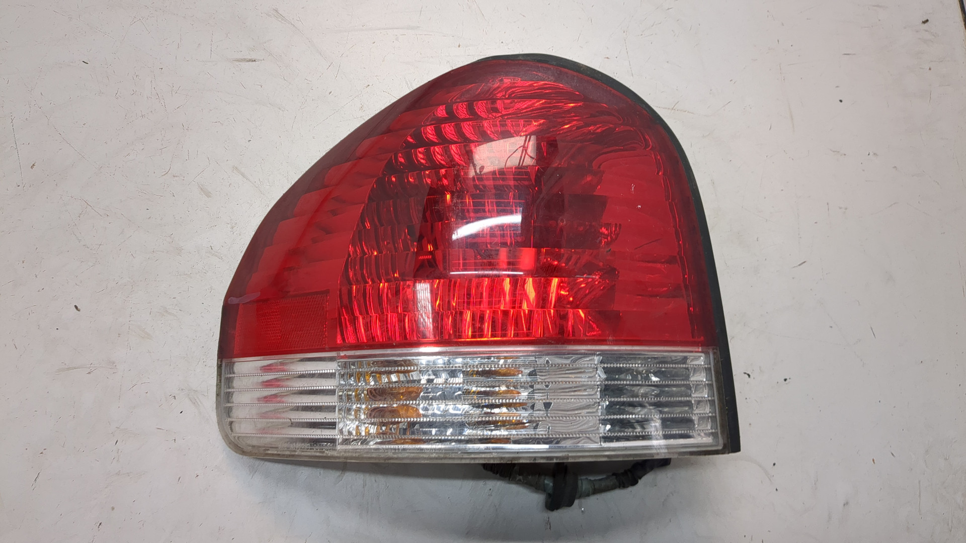 Фонарь задний левый