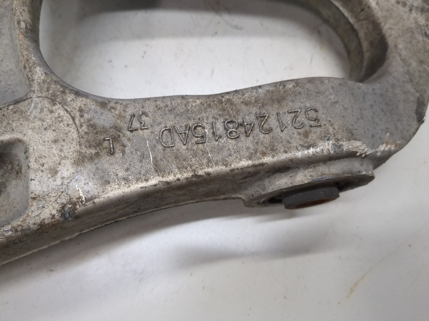 Рычаг задний левый