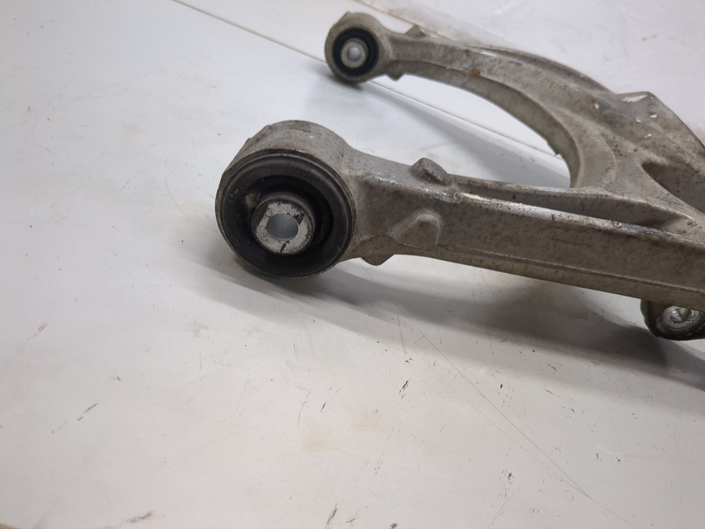Рычаг задний левый