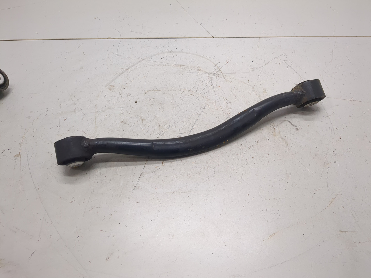 Рычаг задний