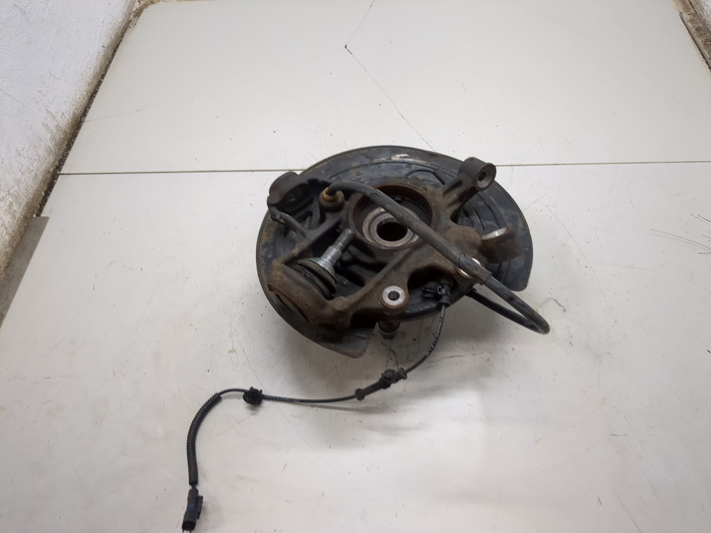 Кулак поворотный задний левый