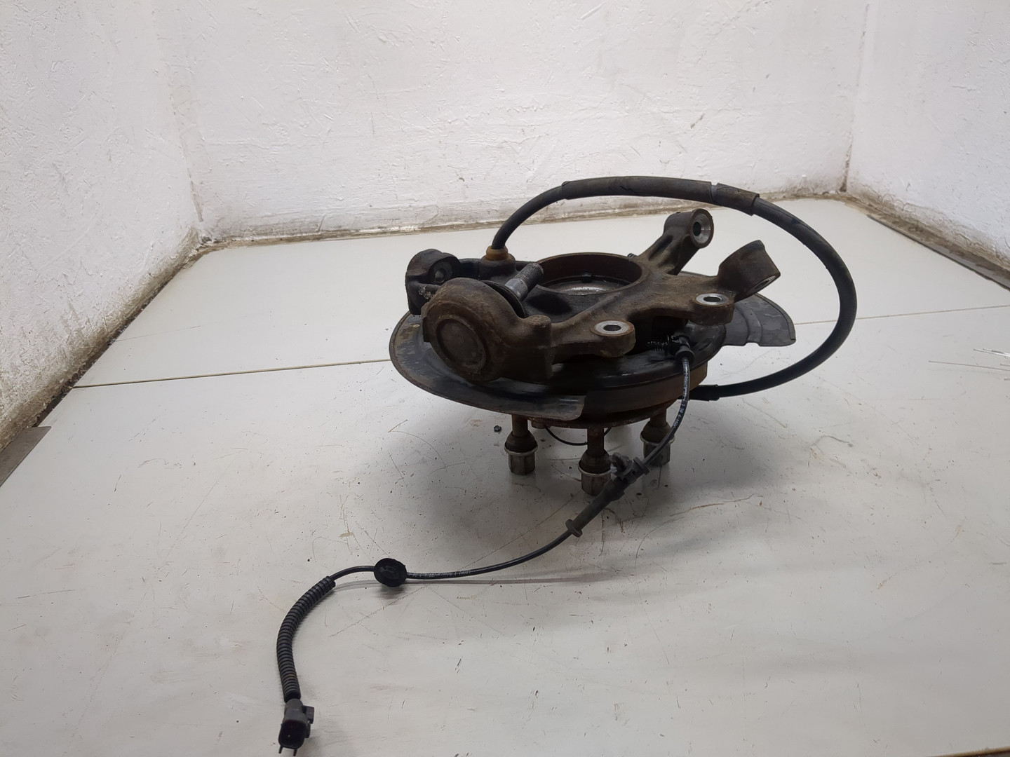 Кулак поворотный задний левый