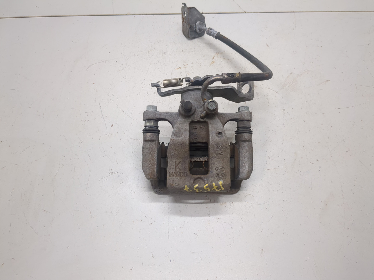 Суппорт задний левый