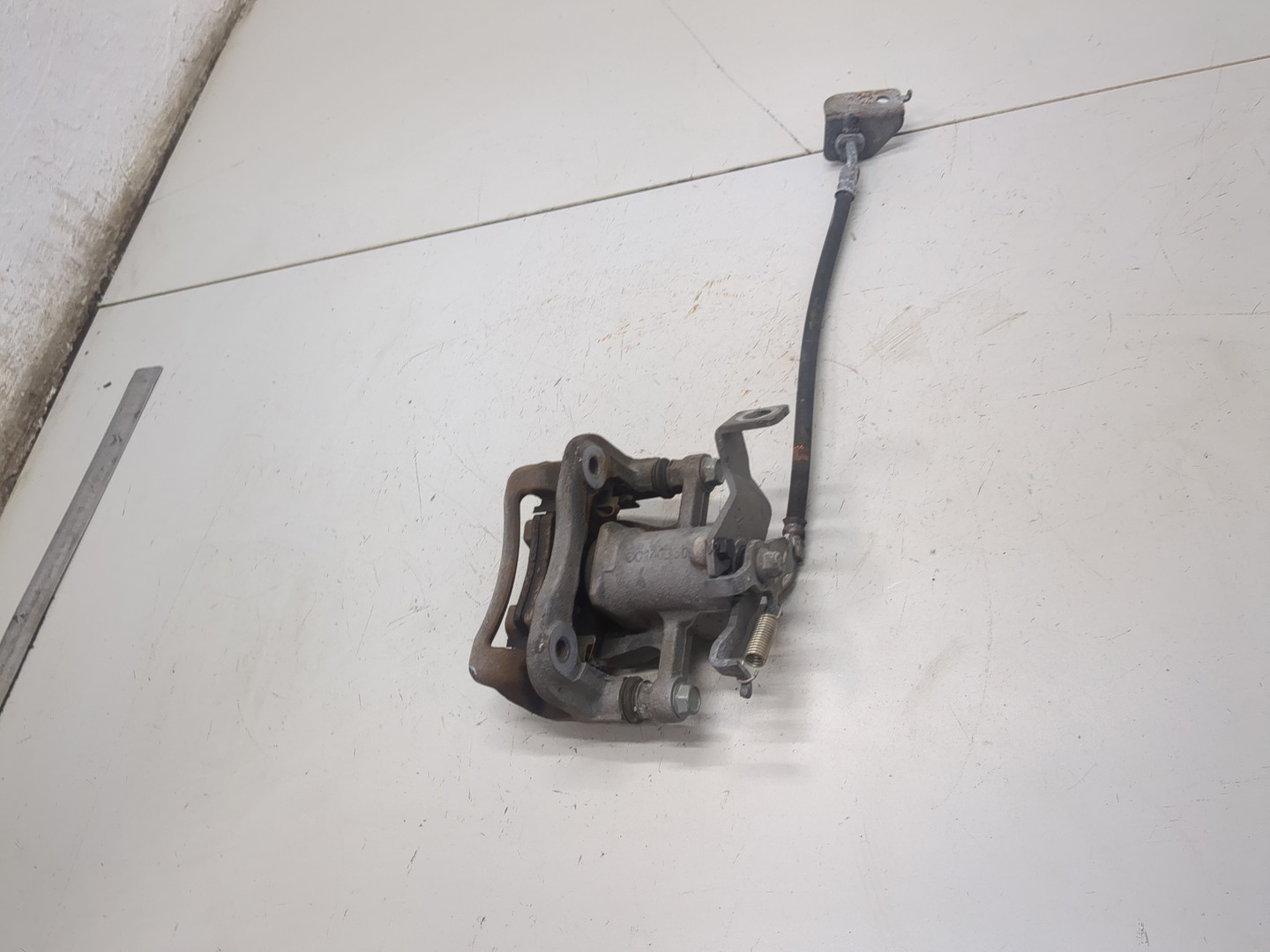 Суппорт задний левый