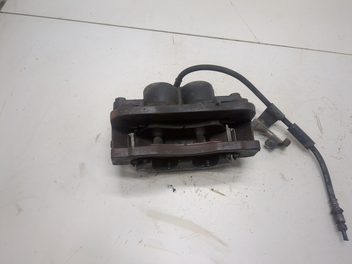 Суппорт передний левый