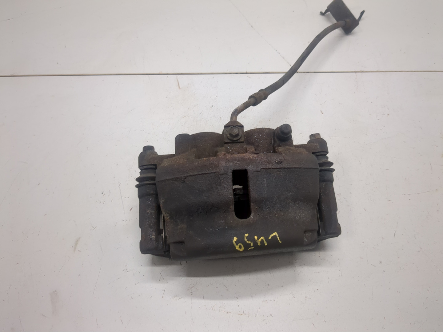 Суппорт передний левый