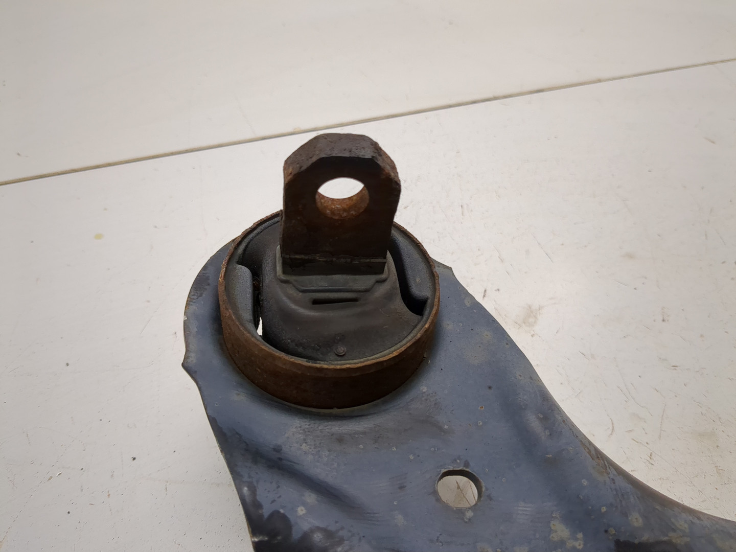 Рычаг задний левый