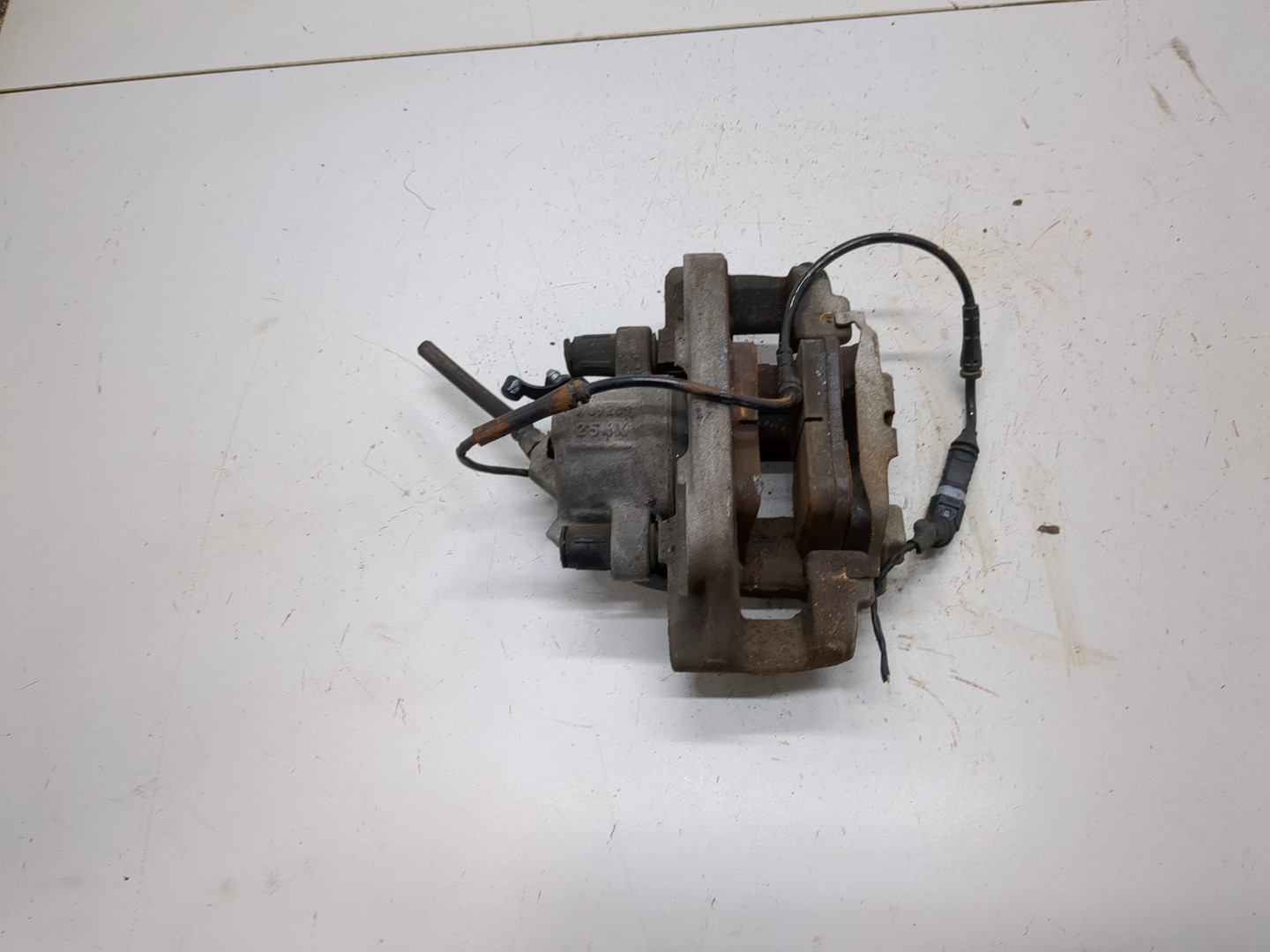 Суппорт передний левый