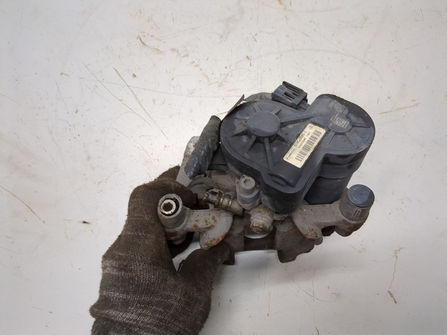 Суппорт задний левый