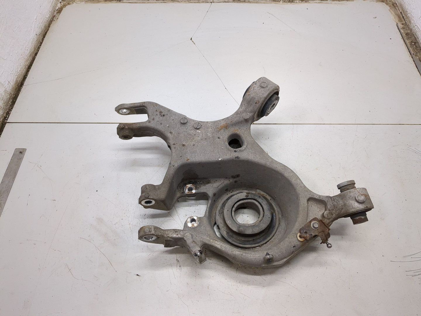 Рычаг задний левый