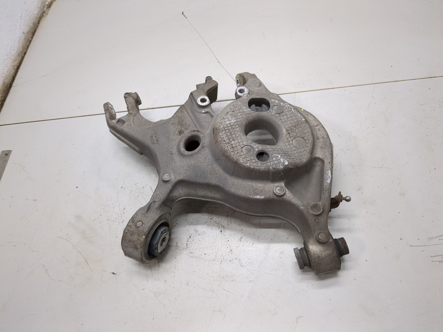 Рычаг задний левый