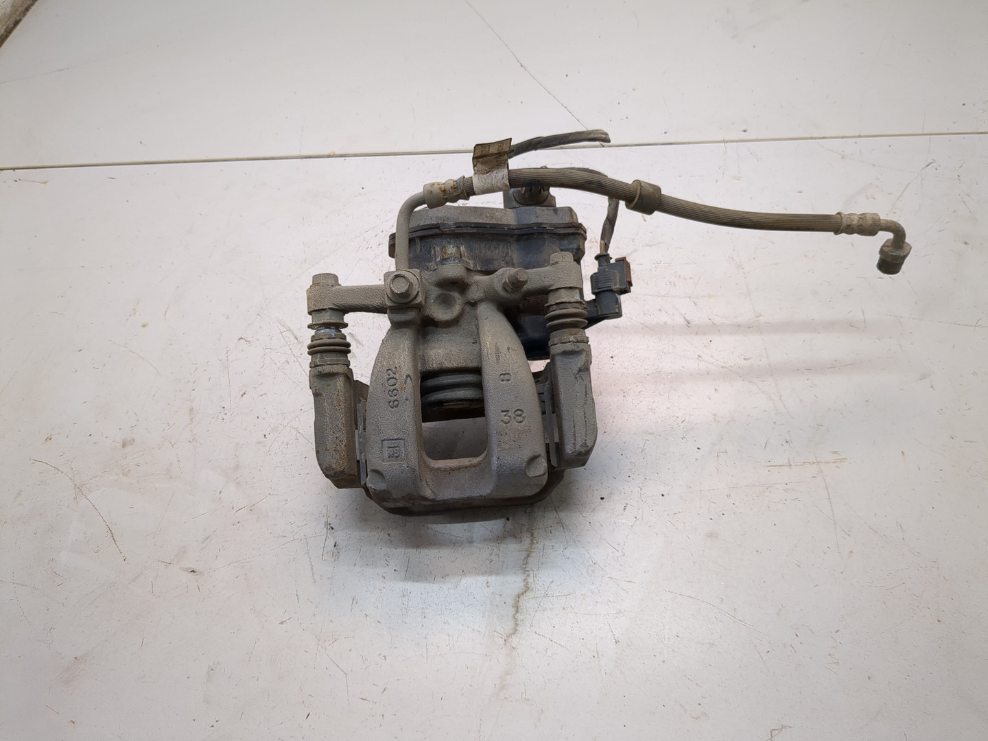 Суппорт задний левый