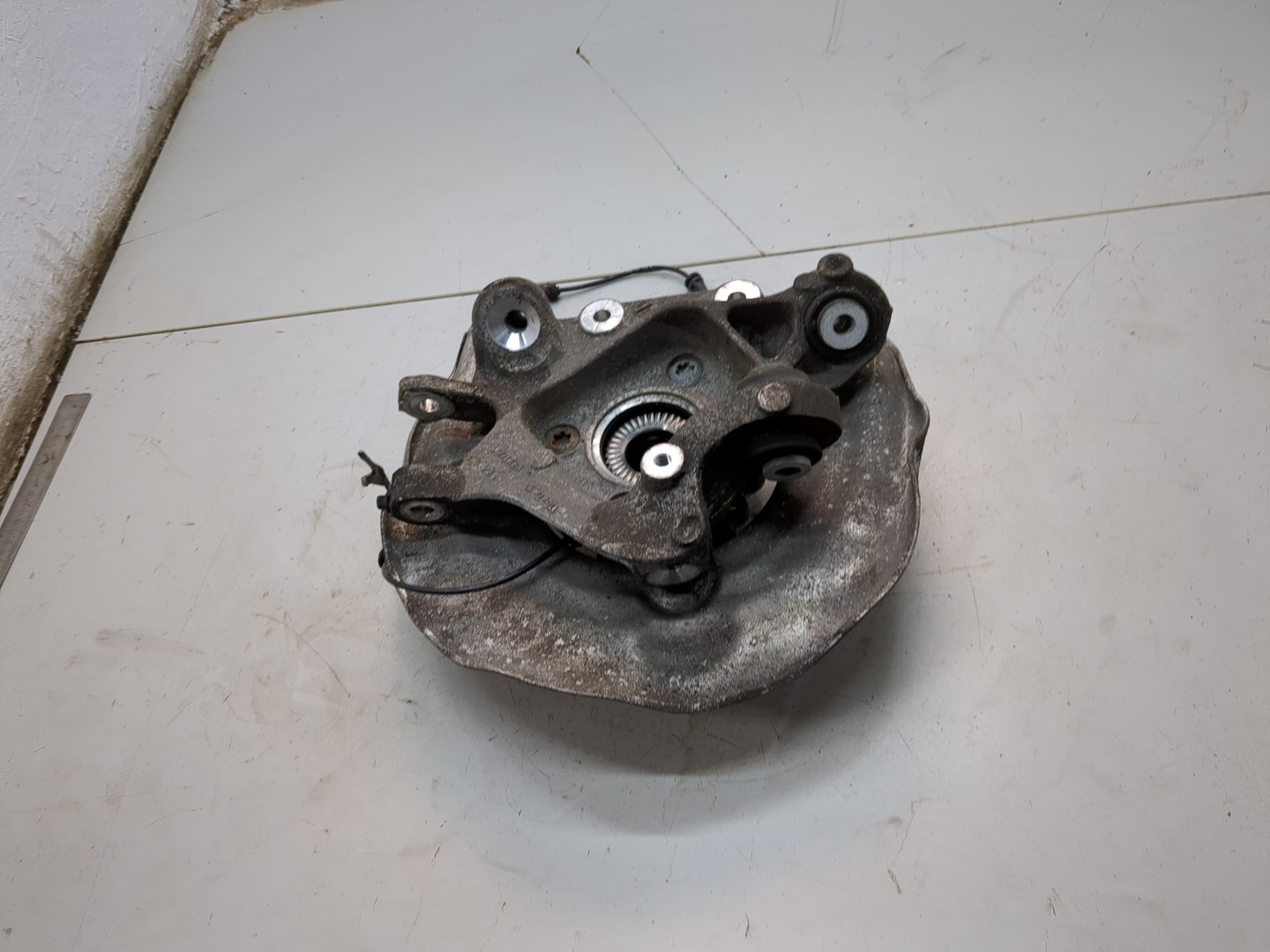 Кулак поворотный задний левый