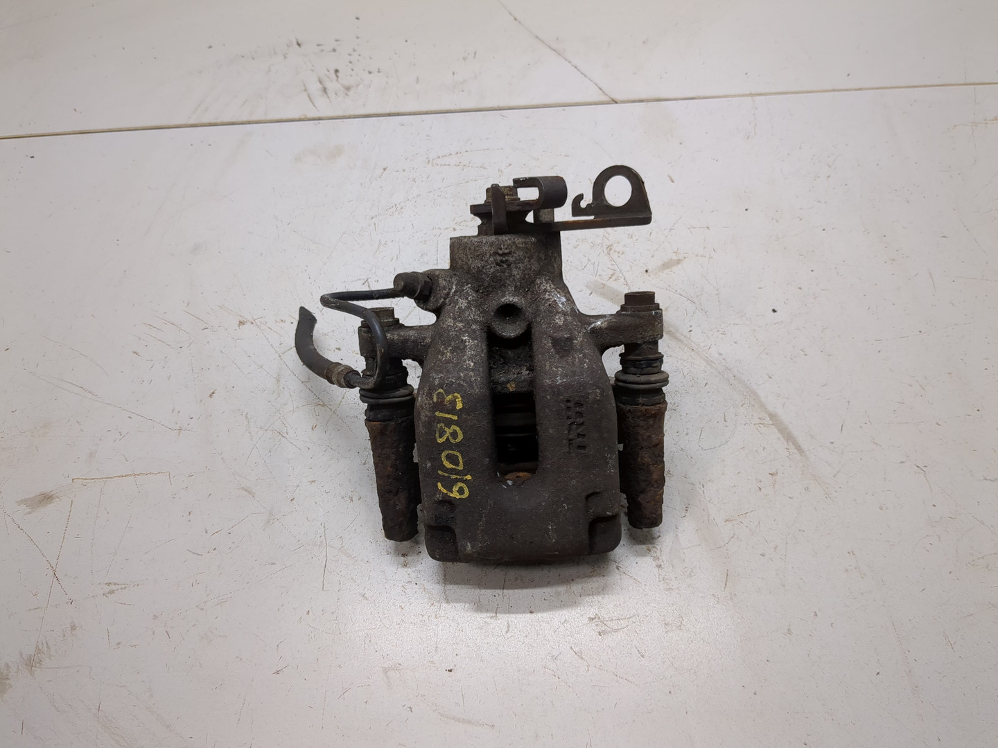 Суппорт задний левый