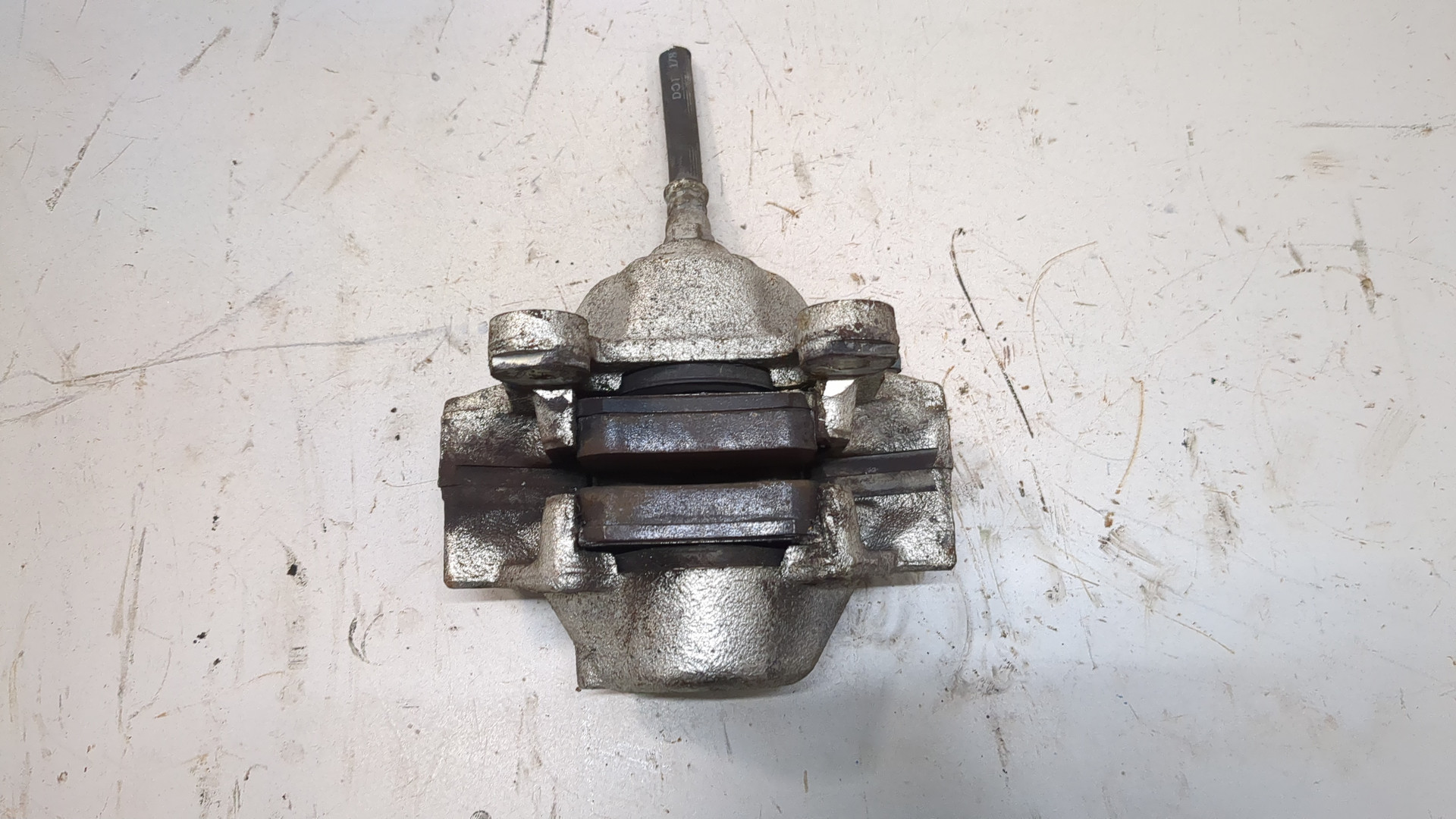 Суппорт задний левый