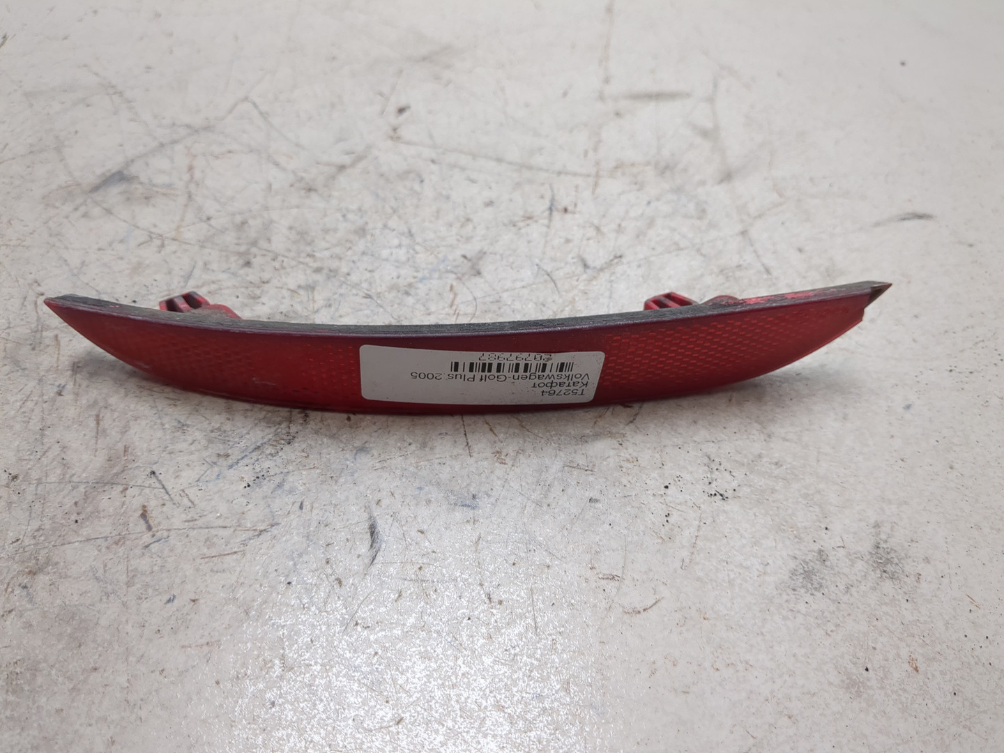 Отражатель в бампер задний левый