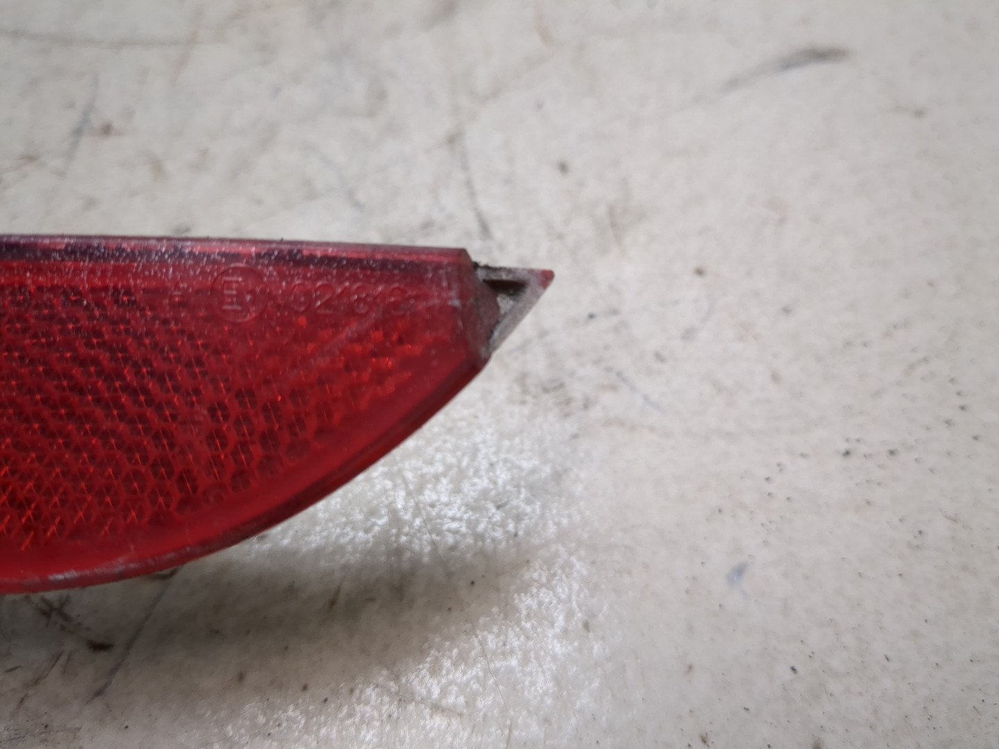 Отражатель в бампер задний левый