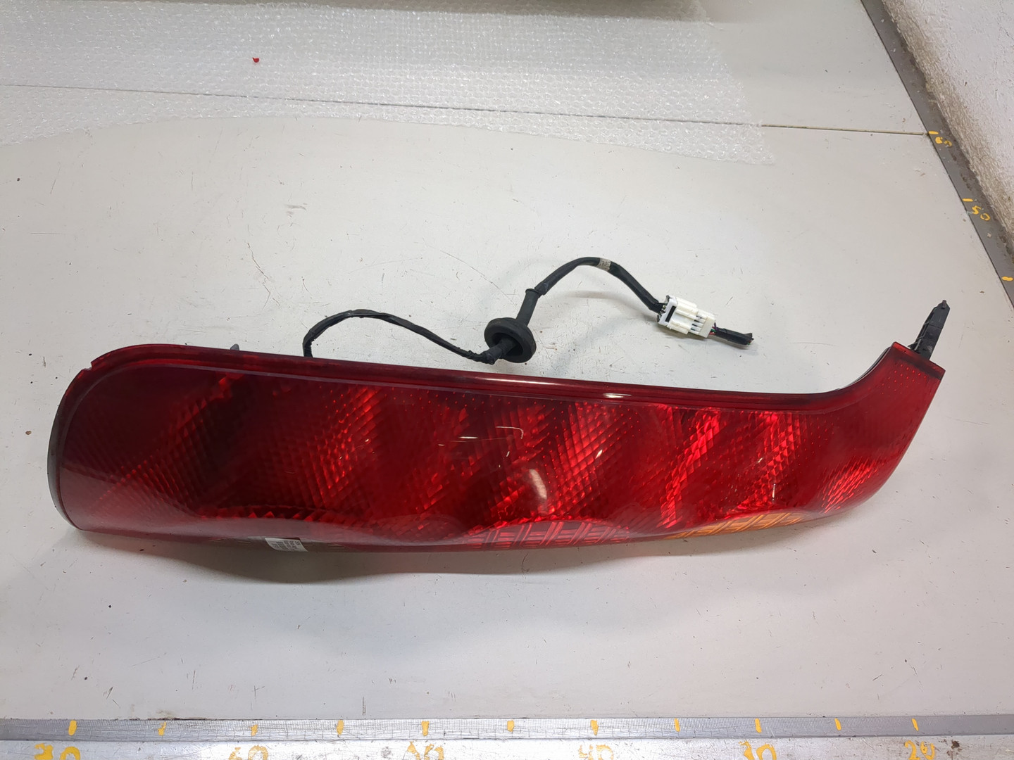 Фонарь задний левый