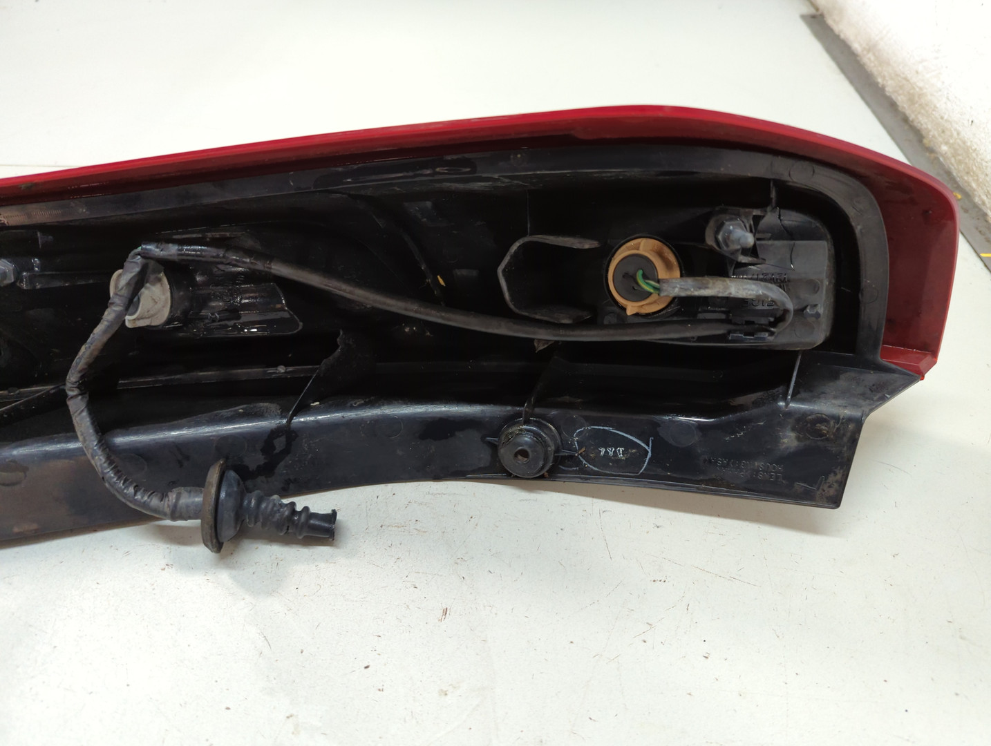 Фонарь задний левый