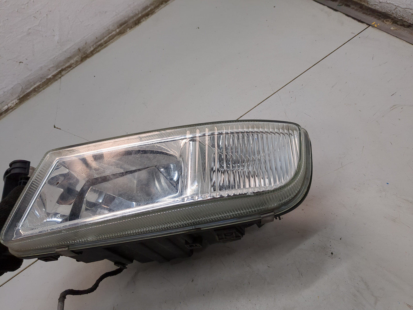 Фара противотуманная левая