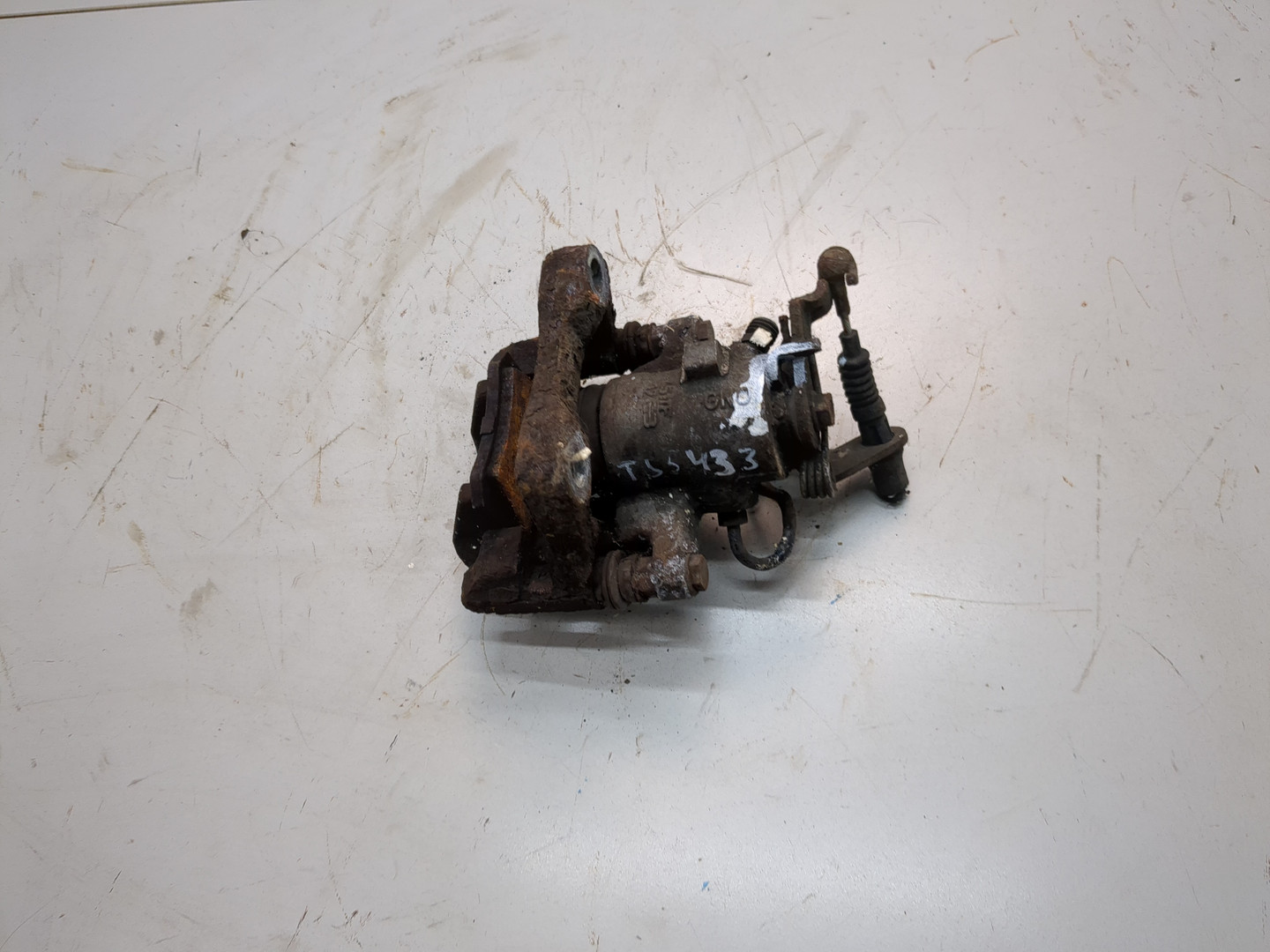 Суппорт задний левый