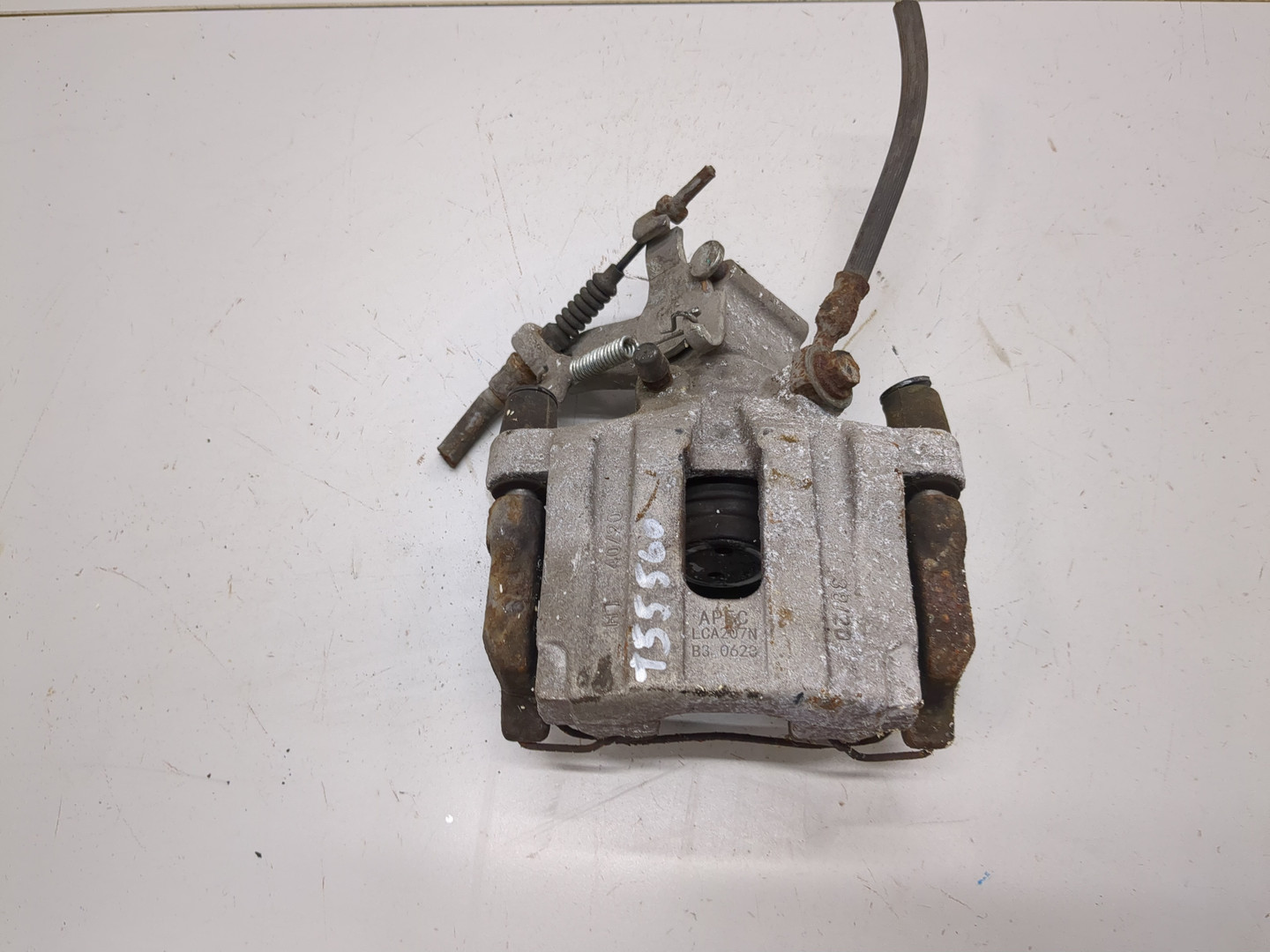 Суппорт задний левый